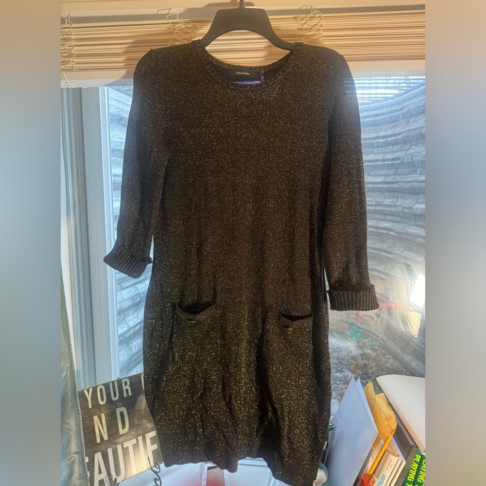 Black sweater dress in sparkling with gold accents